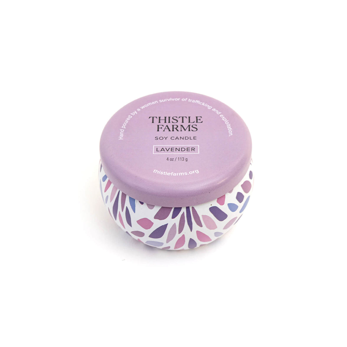 Thistle Farms lavender candle on a white background
